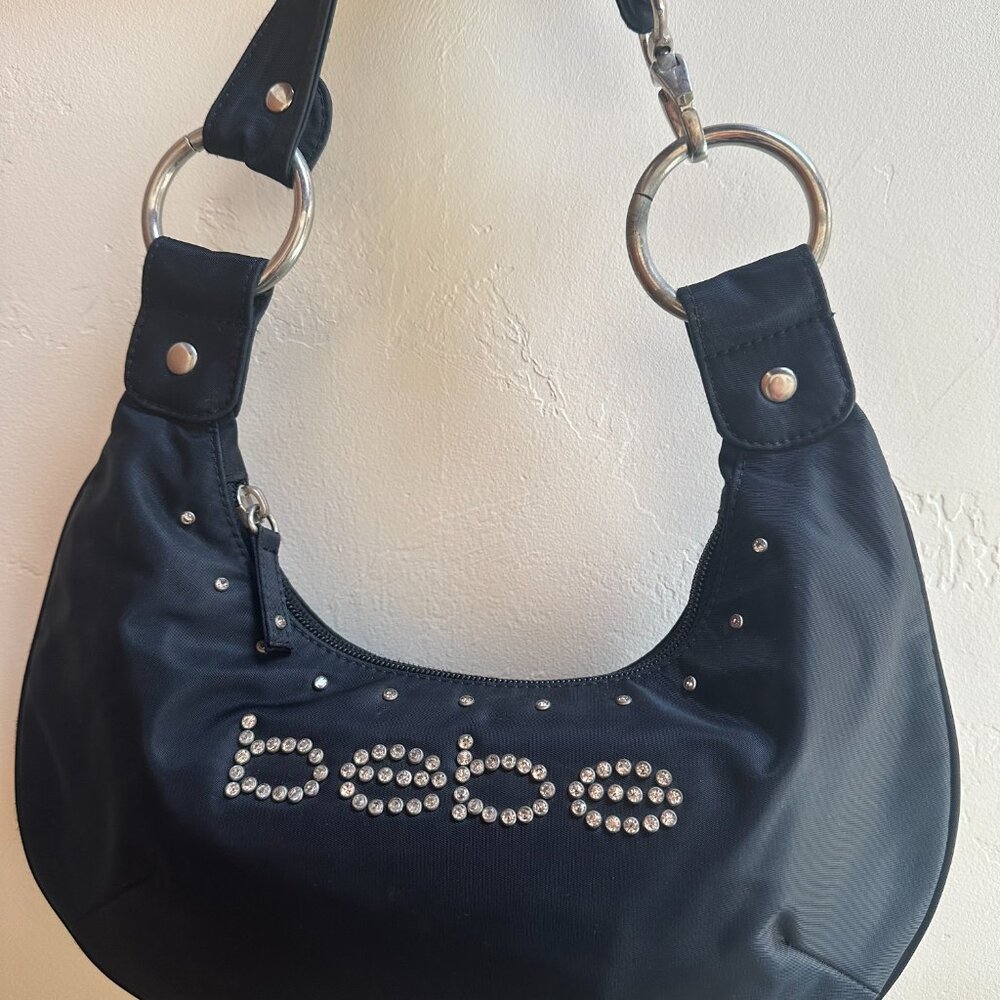 bebe Rhinestone Logo Black mini shoulder or hand bag.  Hot pink interior!
